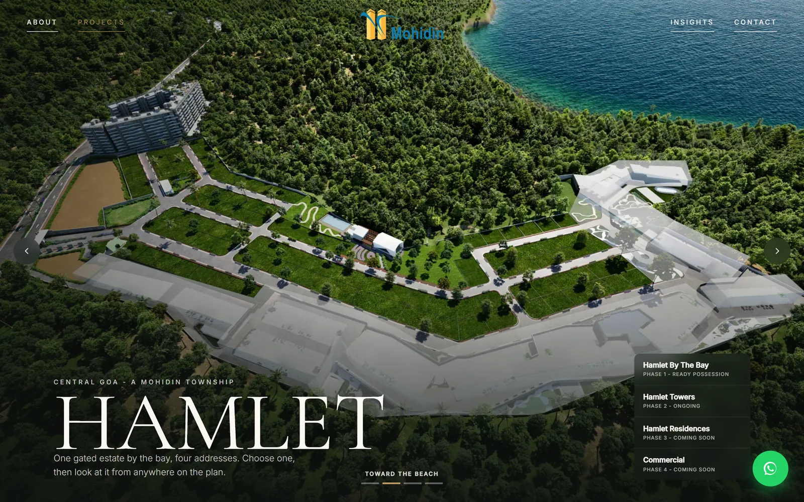 Toward-the-beach vantage: plotted rows and clubhouse in the foreground, the headland and open water behind
